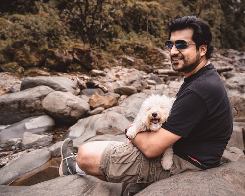 Azar with his dog beside the river, Rio Agrio, Alajuela