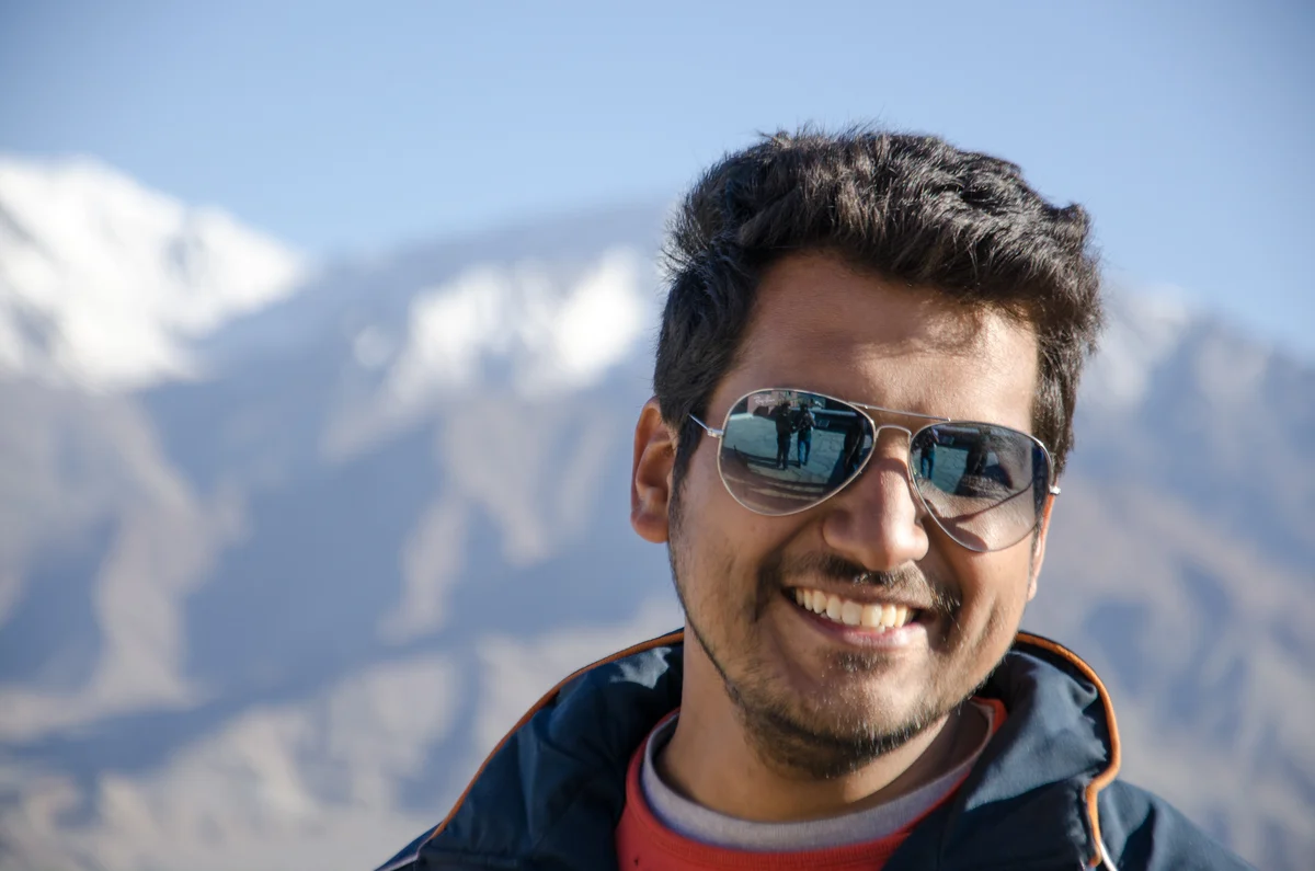 Azar smiling against the mountains, Himachal Pradesh