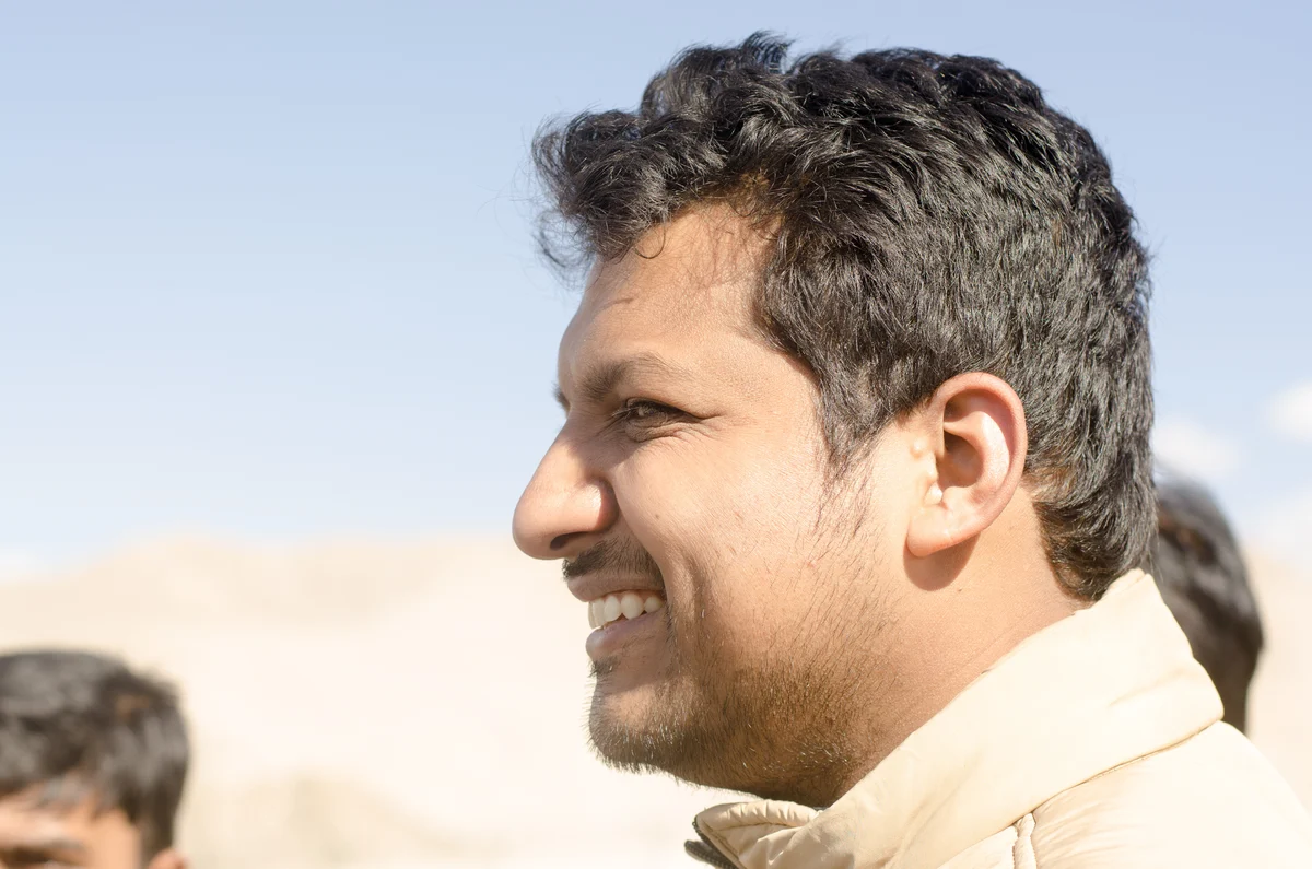 Azar smiling in profile, Himachal Pradesh