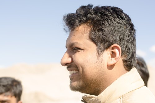Azar smiling in profile, Himachal Pradesh