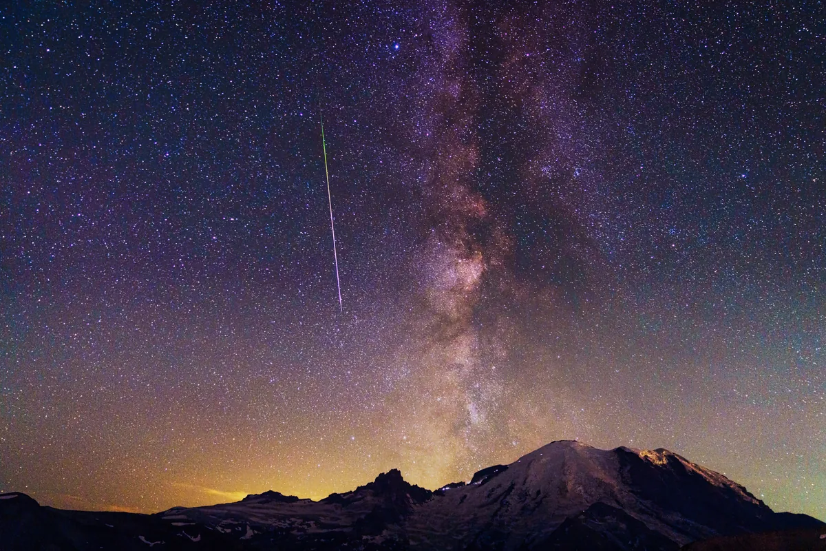 Milky Way and a meteor over Mount Rainier, Washington