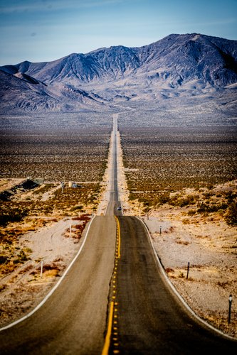 Open road through the desert, Beatty, Nevada
