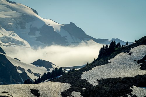 Clouds between snowy slopes, Deming, Washington