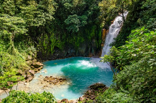 Turquoise waterfall in tropical forest, Bijagua, Alajuela