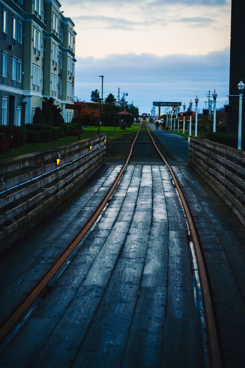Wet boardwalk beside the tracks, Astoria, Oregon