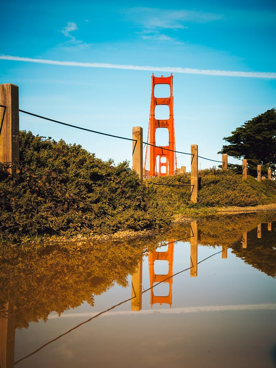 Golden Gate Bridge in a puddle, San Francisco, California
