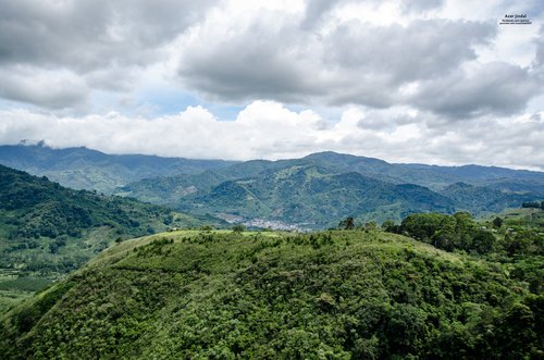 Rolling hills beneath clouds, Paraíso, Cartago